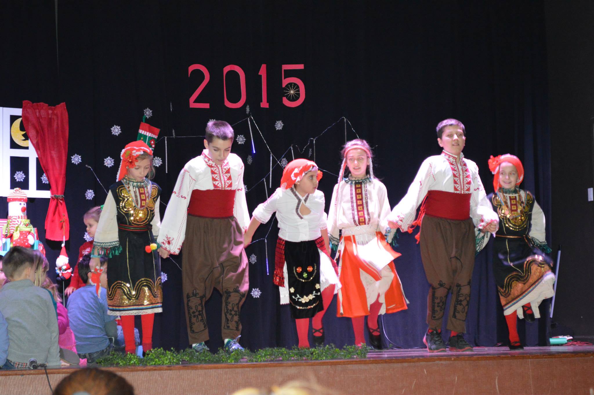 Students performing a Bulgarian folk dance